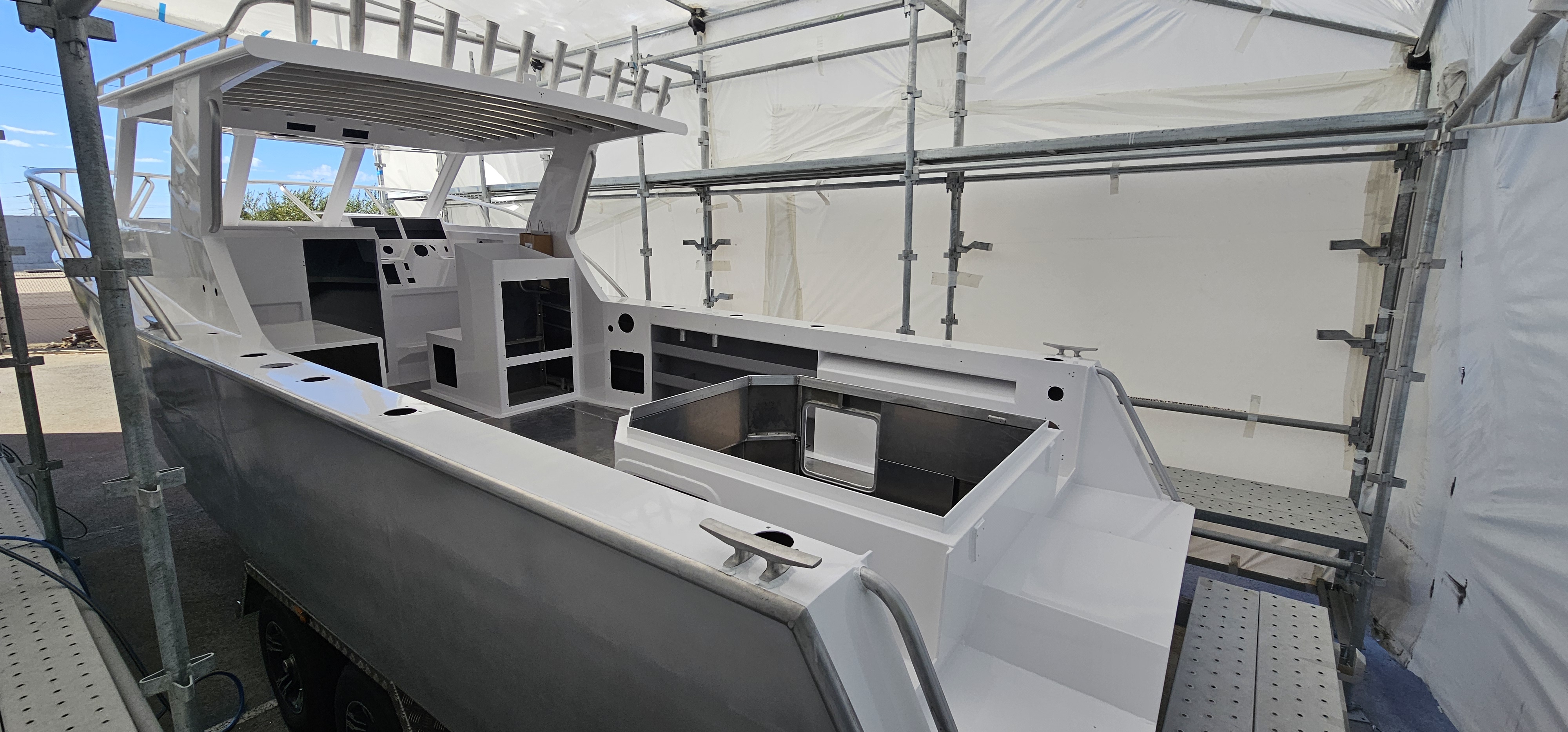 Aluminium vessel completed by Extreme Finishings showing selective use of NYALIC clear corrosion protection below the gunnels